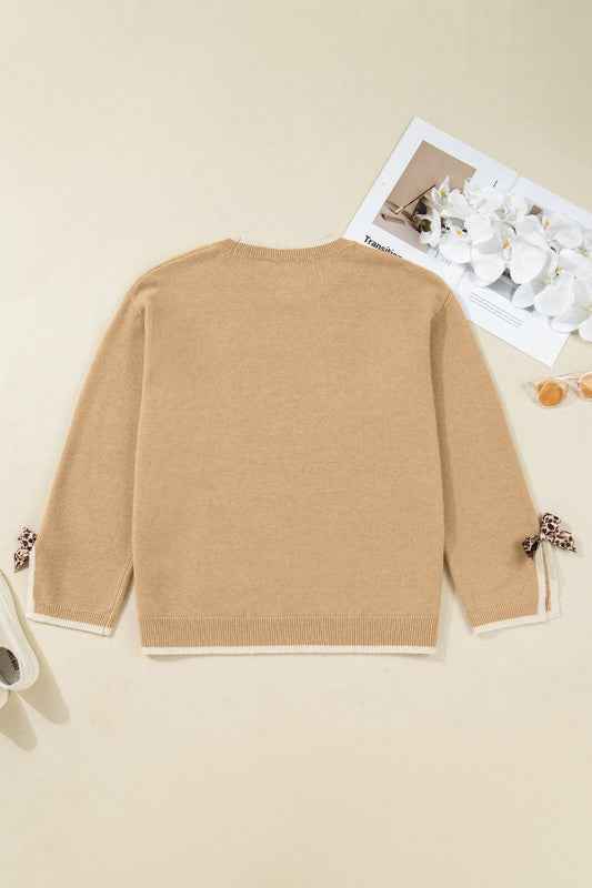 Plus Size Leopard Bow Split Cuff Sweater 3105807f-0b8b-4e0f-bf19-7067de2eff97