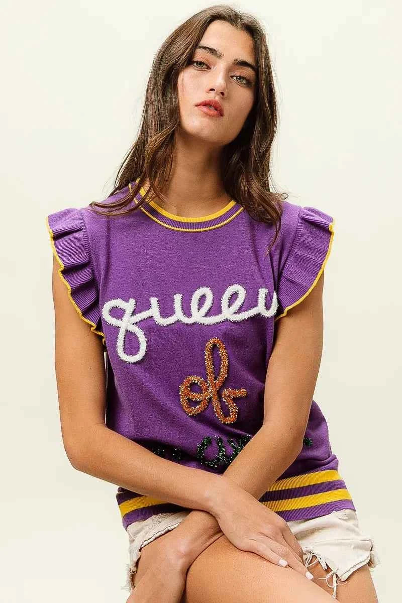 BiBi Queen Of Mardi Ruffled Armhole Sleeveless Knit Top 4b6c131911364d9ab1cc293ab8ab4594-Max-Origin