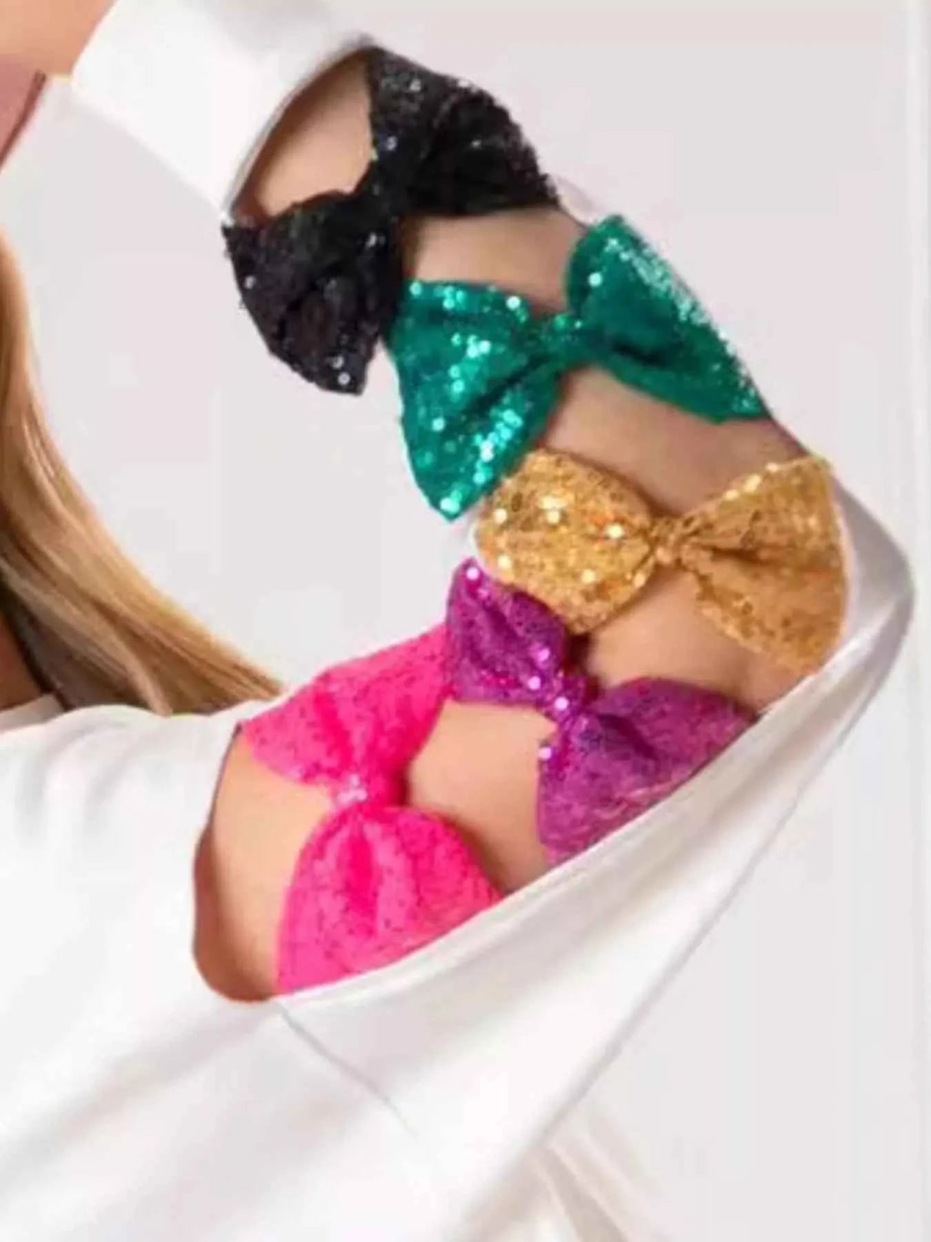 Sequin Bow Cutout Round Neck Sweatshirt 7432d469-0510-4453-974a-838041c37ef5-Max-Origin