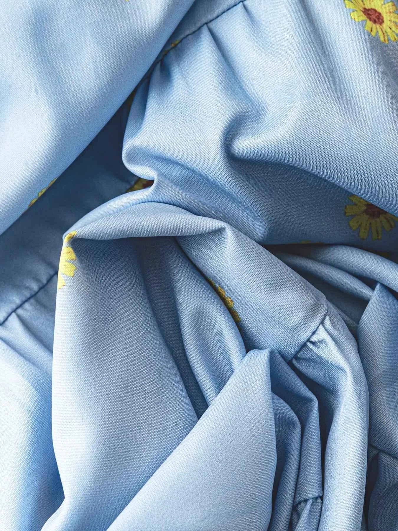 Daisy Print Puff Sleeve Tiered Maxi Dress a9749ac8-2315-46ef-83b0-3946543a65a2-Max-Origin