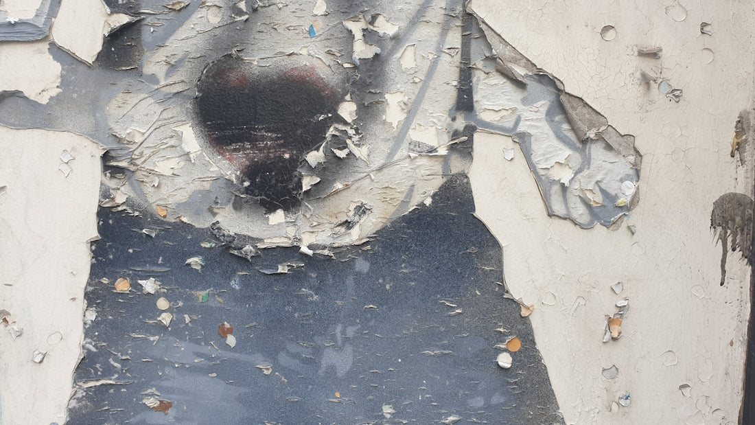 A picture of a dog on a wall