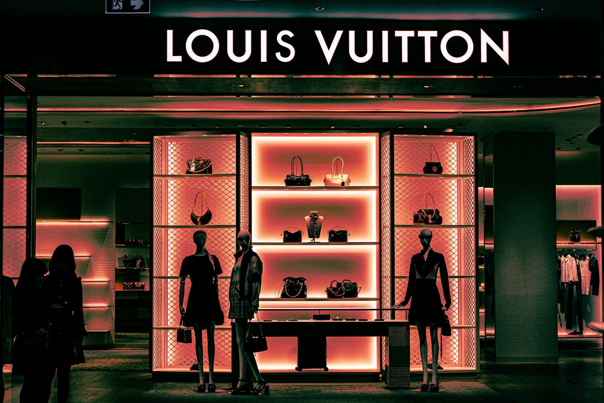 Louis vuitton store with mannequins and handbags