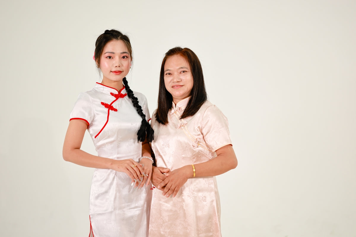 Two women in traditional chinese dresses