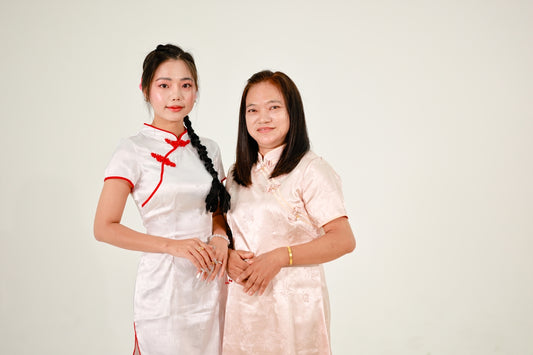Two women in traditional chinese dresses