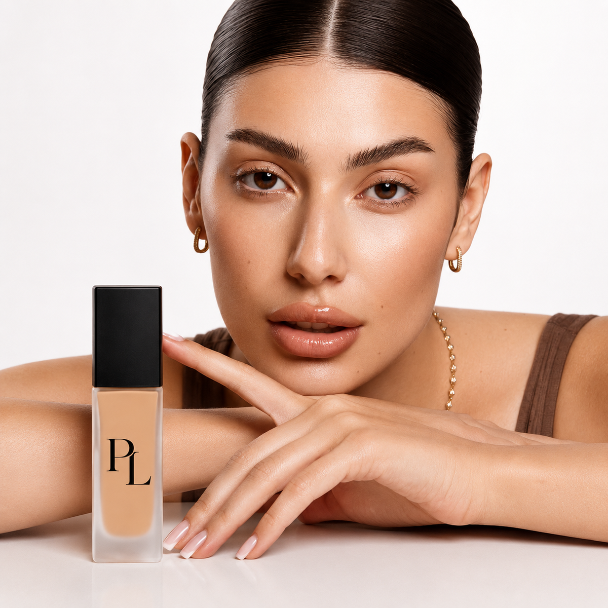 Minimalist cosmetic bottle with logo