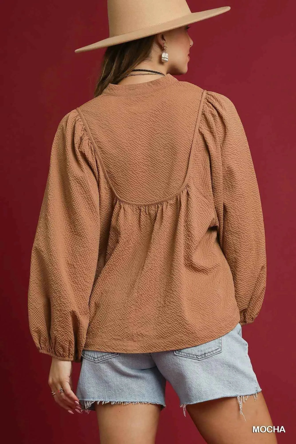 Umgee Textured Notched Blouse with Balloon Sleeves 01fc8fb0-7d74-4168-8ed6-e99b5de6a2cb-Max-Origin