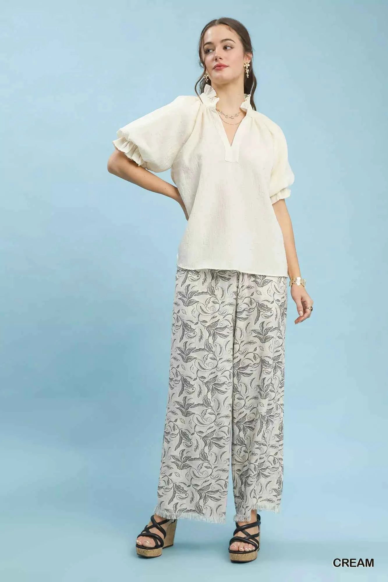 Umgee Textured Puff Sleeve Split Neck Top 04b63fb7-1edb-4ab9-abad-864bd11da238-Max-Origin