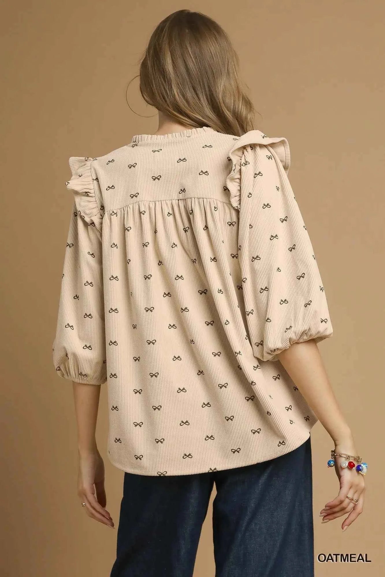 Umgee Bow Print Corduroy Puff Sleeve Blouse with Ruffled 05fd77fe-f86d-4b8a-88b0-3cfd315c1730-Max-Origin