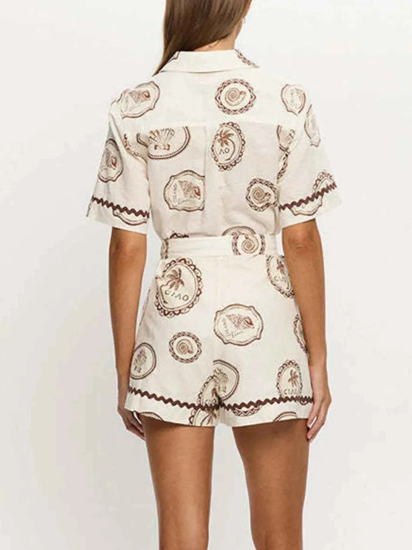 Printed Button-Up Half Sleeve Romper 09158fe9-cc81-4df2-b8f6-14d14ef85561-Max-Origin