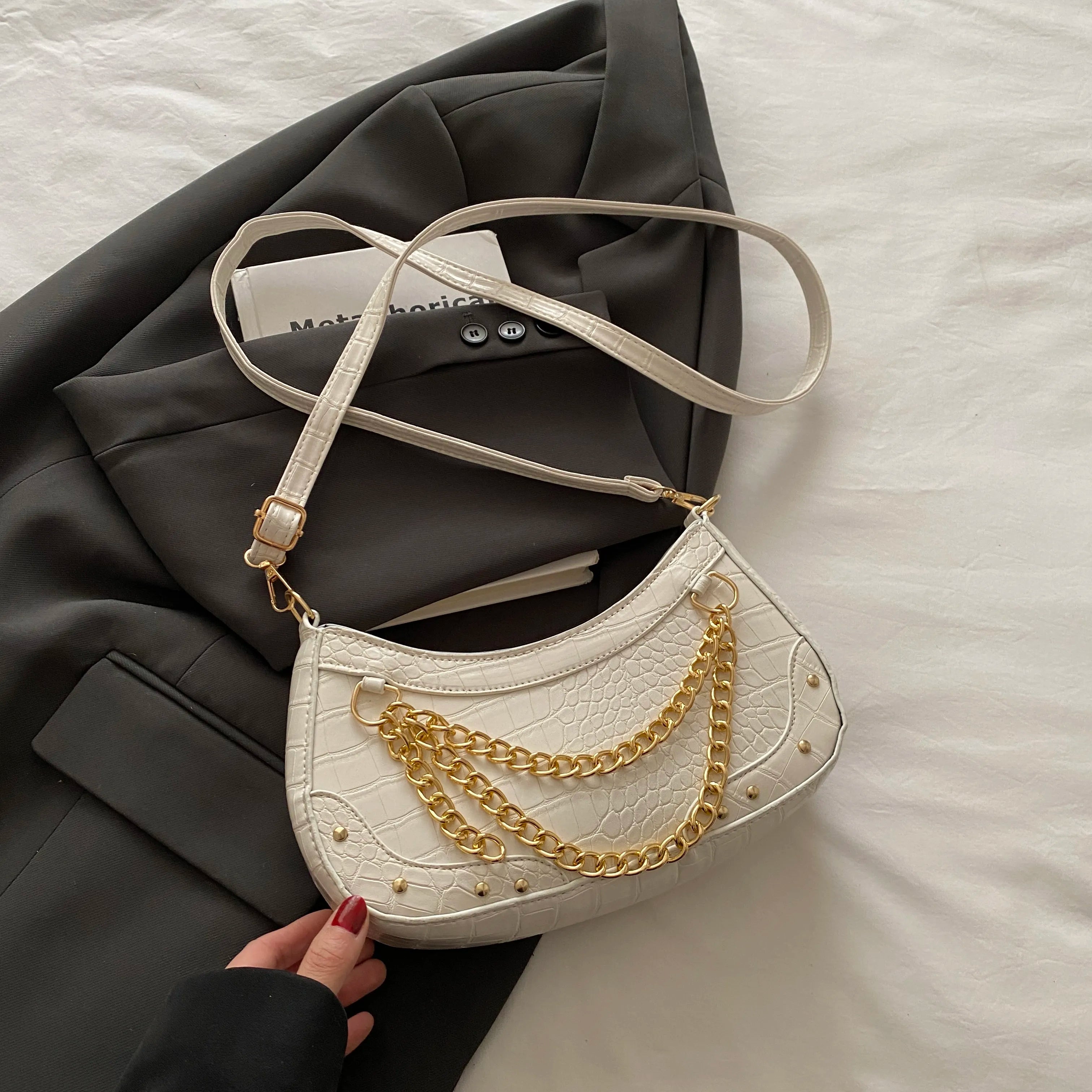 Chain-Embellished Shoulder Bag 09a7f872709b42b2a15b4a898791f335-Max-Origin