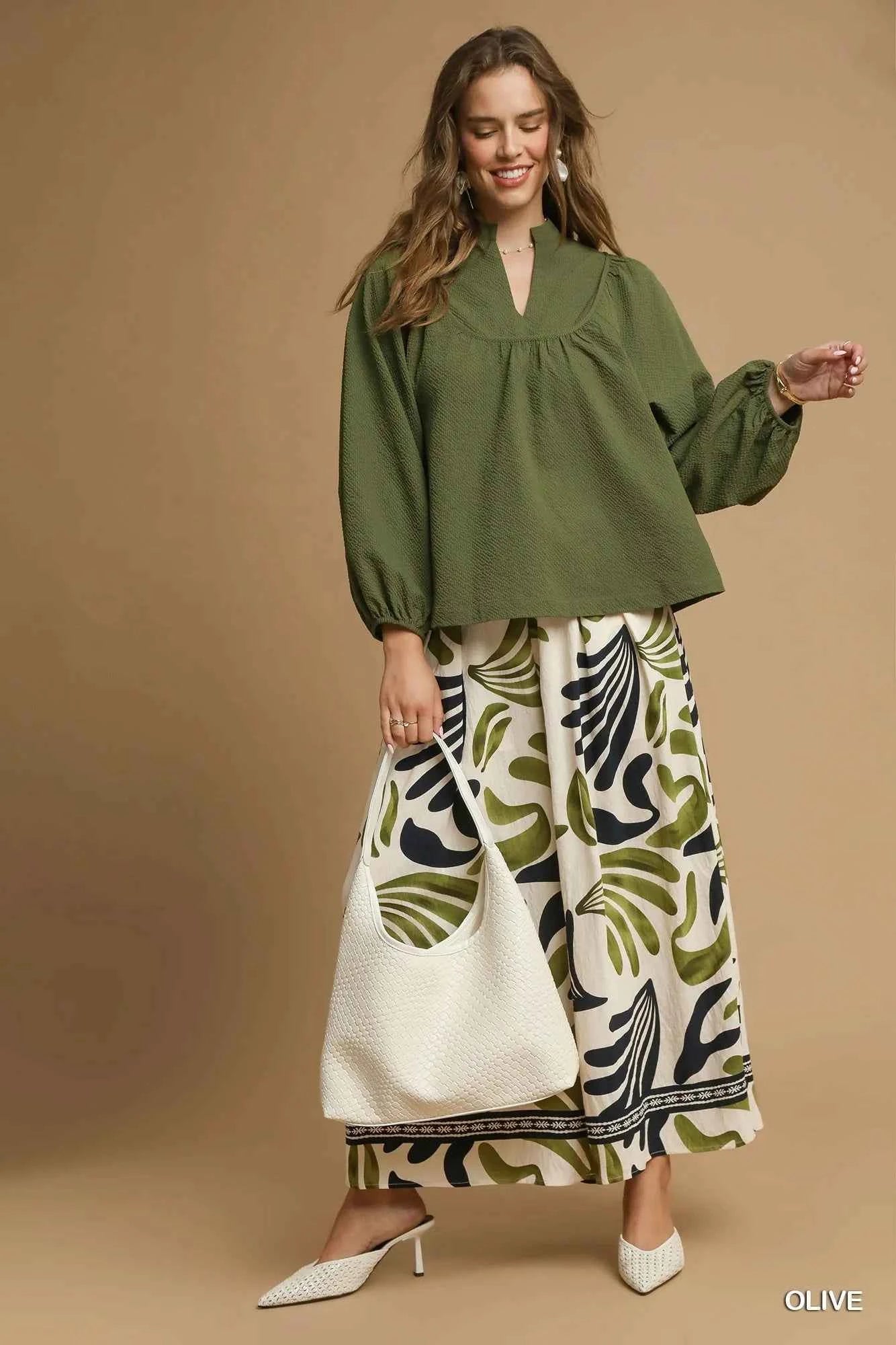 Umgee Textured Notched Blouse with Balloon Sleeves 0b030354-76a6-4c4d-ba16-a694697edc84-Max-Origin