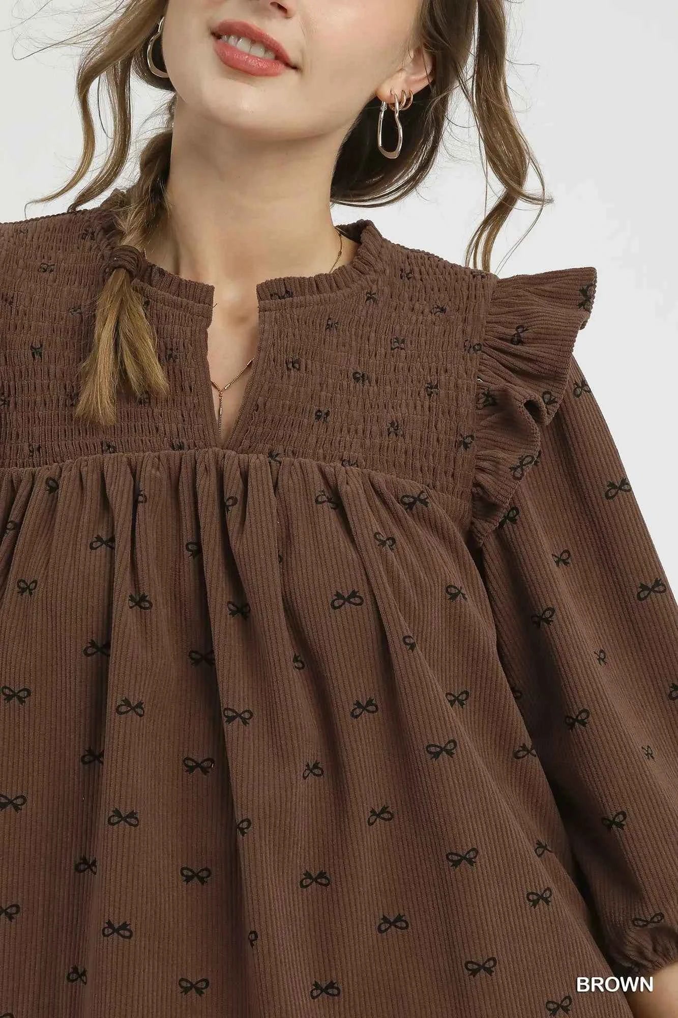 Umgee Bow Print Corduroy Puff Sleeve Blouse with Ruffled 0c181c33-9f33-4907-8a4e-fb43f529b471-Max-Origin
