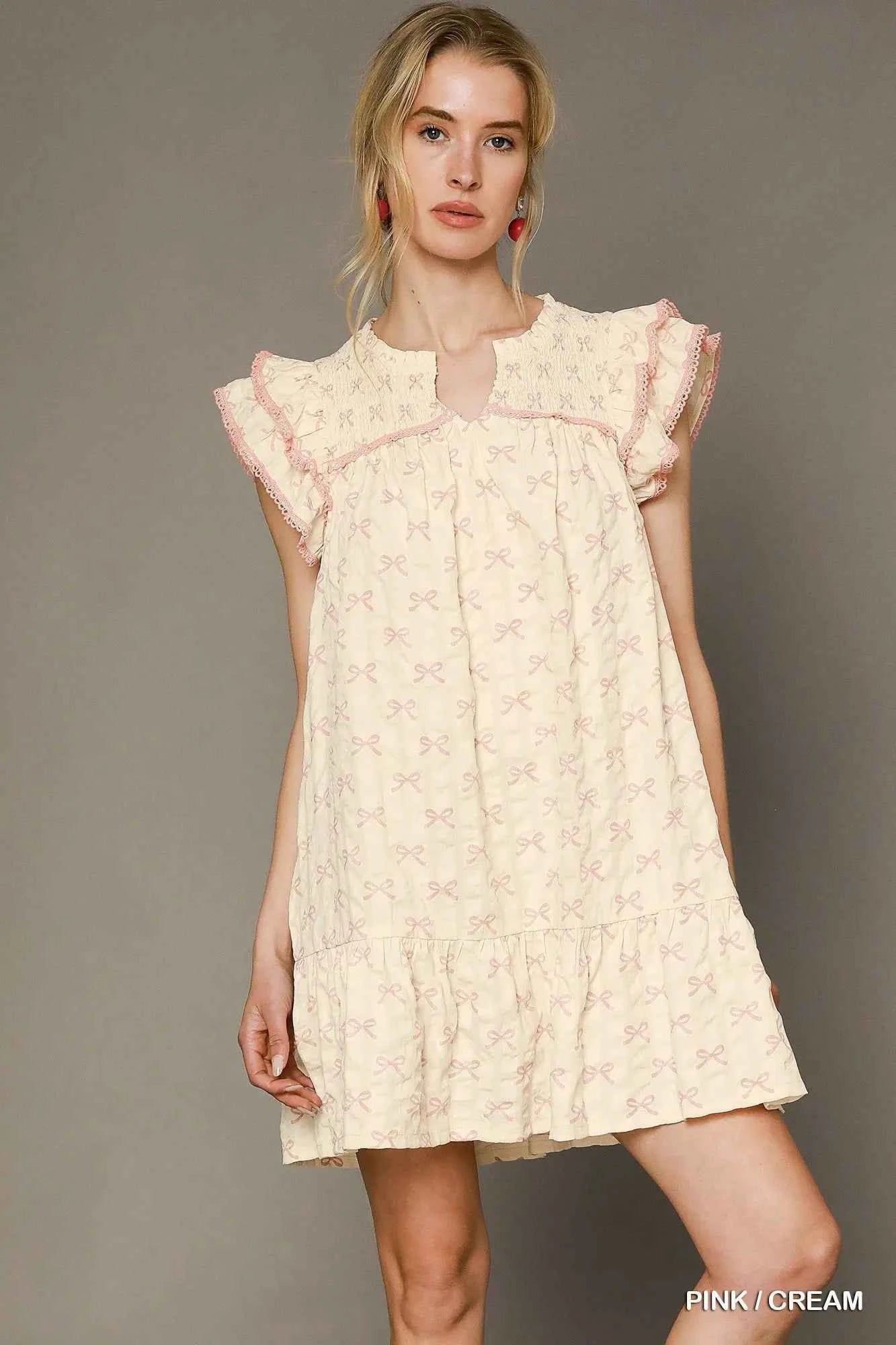Umgee Bow Print Ruffled Cap Sleeve Mini Dress 0cf03e01-54eb-46d7-a90c-f8c50c016306-Max-Origin