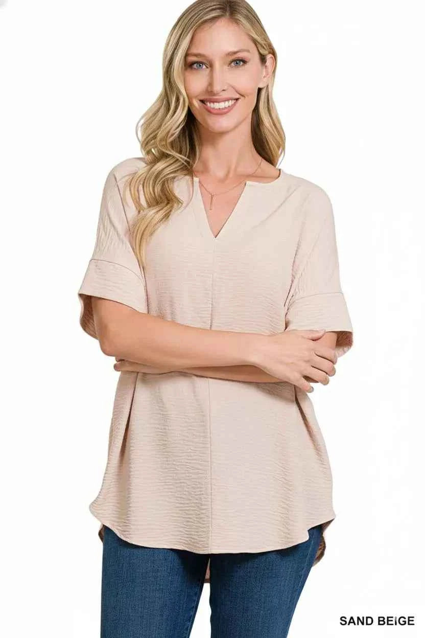 Zenana Woven Airflow Split Neck Short Sleeve Top 0e3cdcb1-72e8-4fb8-8e19-8879d67a9ce0-Max-Origin
