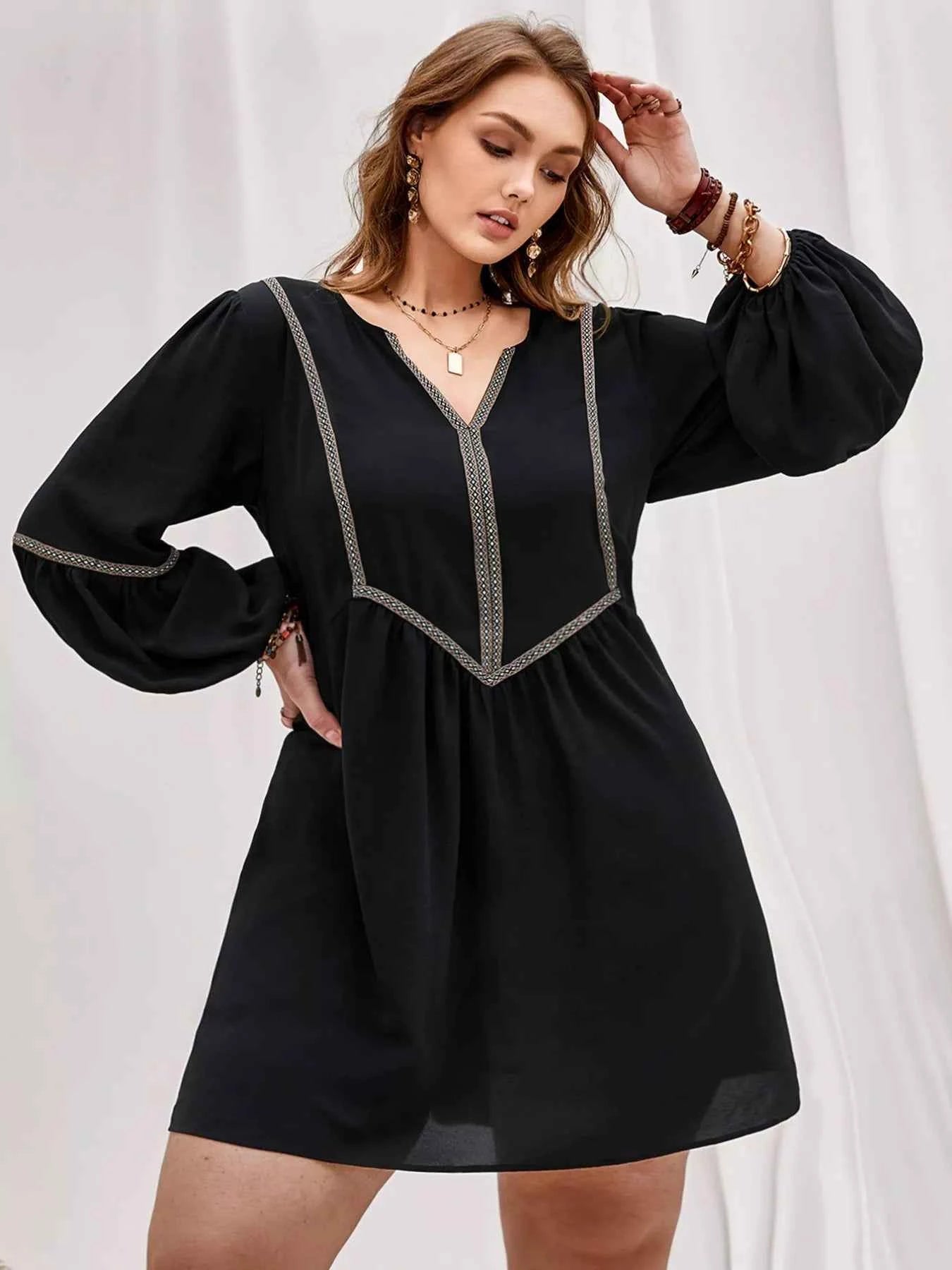 Plus Size Notched Balloon Sleeve Mini Dress 100d1187-577e-447b-8802-6a1373b36404-Max-Origin