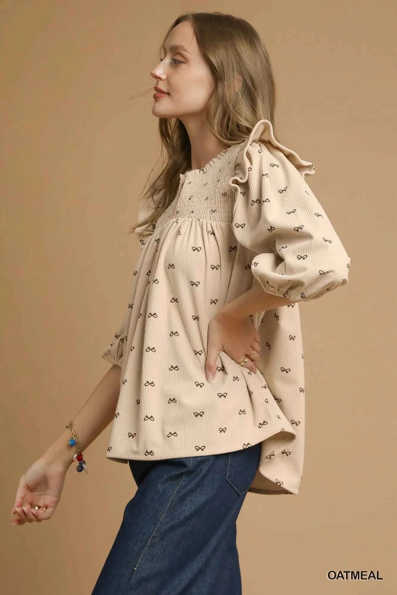 Umgee Bow Print Corduroy Puff Sleeve Blouse with Ruffled 1770a069-d2ee-42ee-806e-93f038f12ae4-Max-Origin