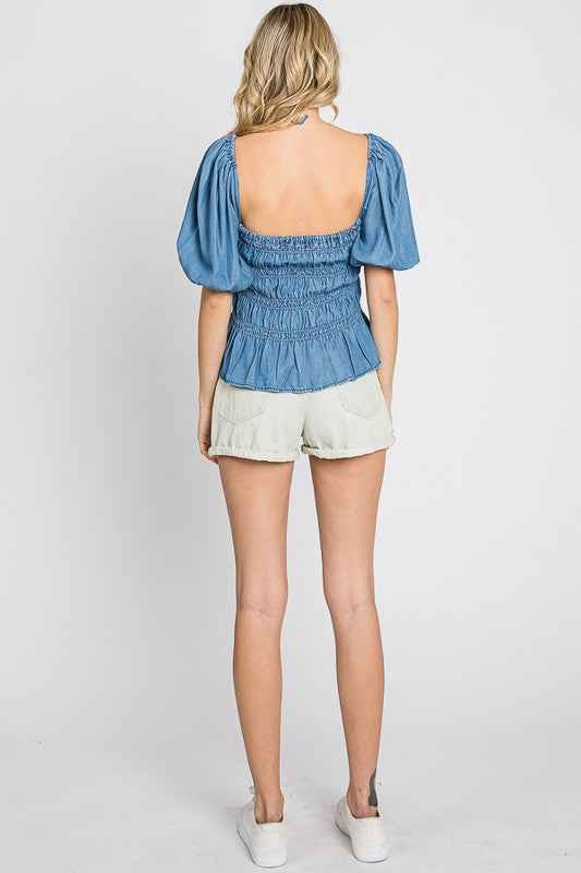 Denim Smocked Peplum Top 18428472_3b40da2e-0a3d-495d-8f2d-57207f827e3a