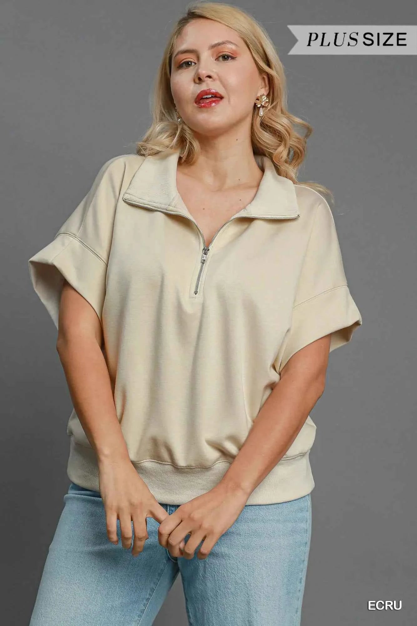 Umgee Full Size Half-Zip Short Sleeve Top Plus Size 19da2fdb-8ca2-4db8-aa68-e10241368852-Max-Origin