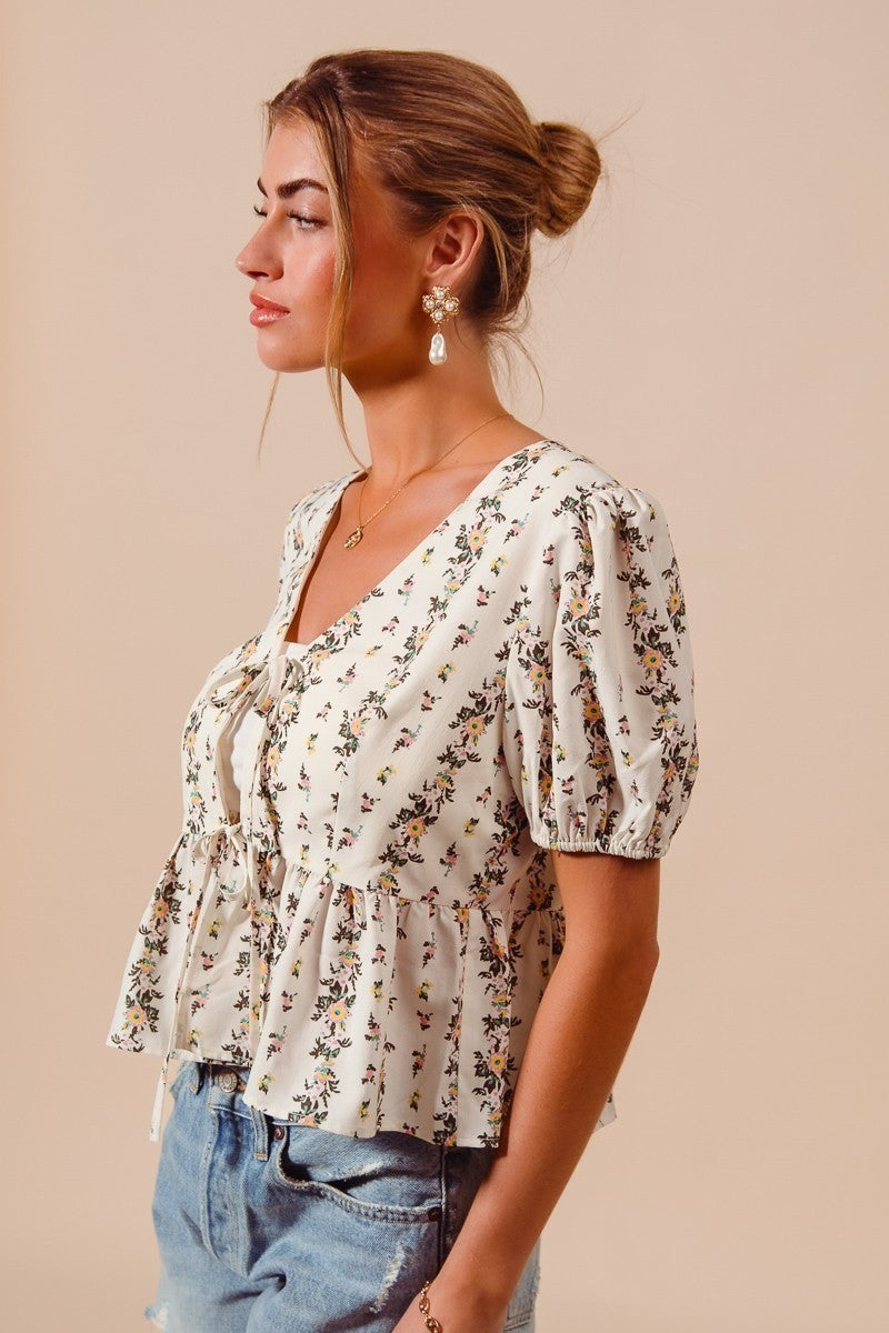 SO ME Floral Print Tie Front Shirred Hem Blouse 1d21547cc31b47f694aa0df50e1dd88d-Max