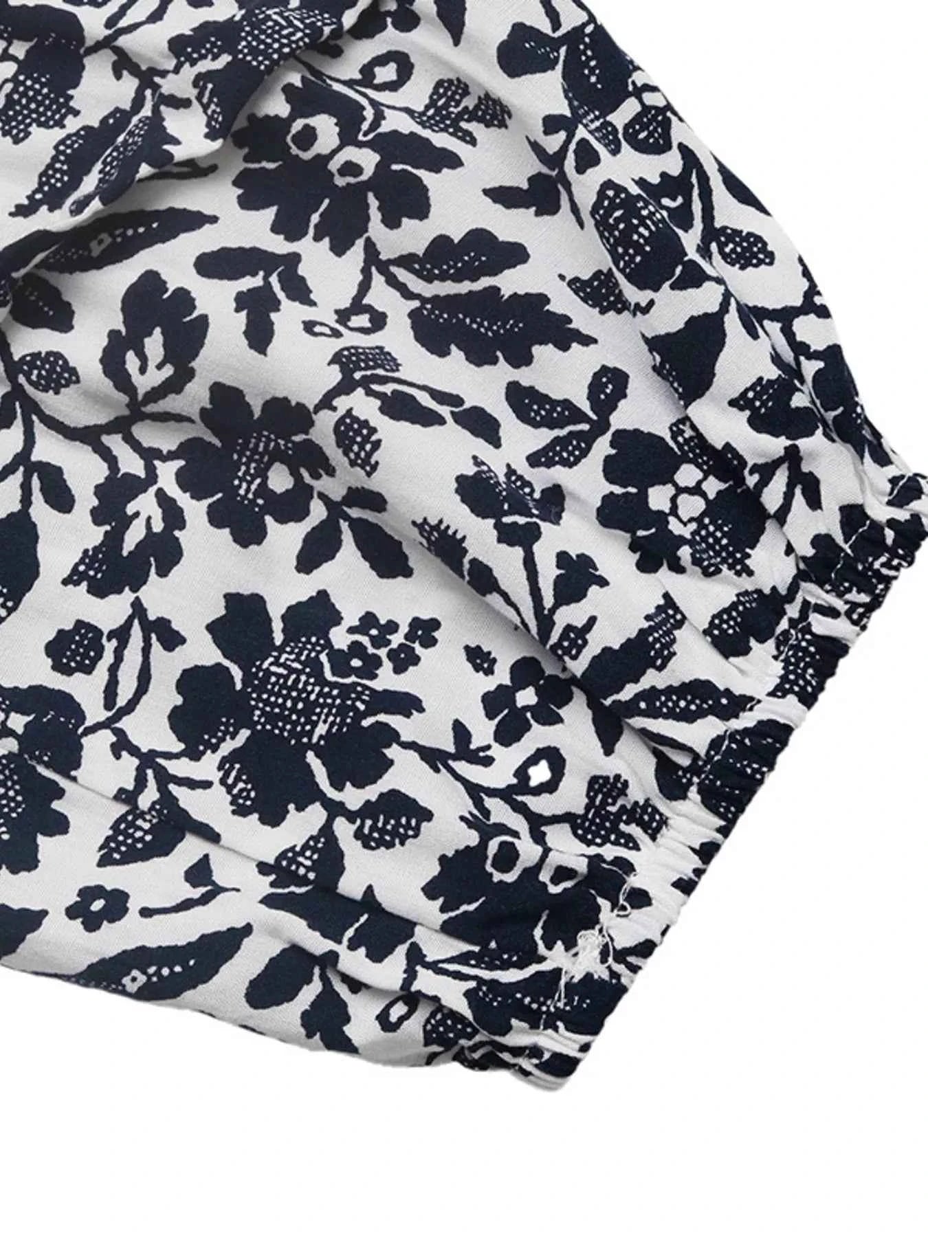 Printed Tie Neck Long Sleeve Blouse 1da1ed53e28d4a9c9e1c88767ec53486-Max-Origin