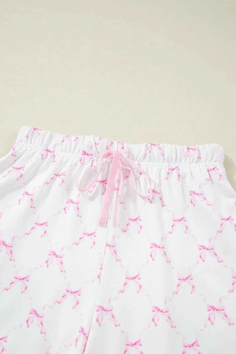 Bow Print Lettuce Trim Round Neck Top and Shorts Lounge Set 1df5bf5f-333b-47fa-bc84-5abf4fe25fe4-Max
