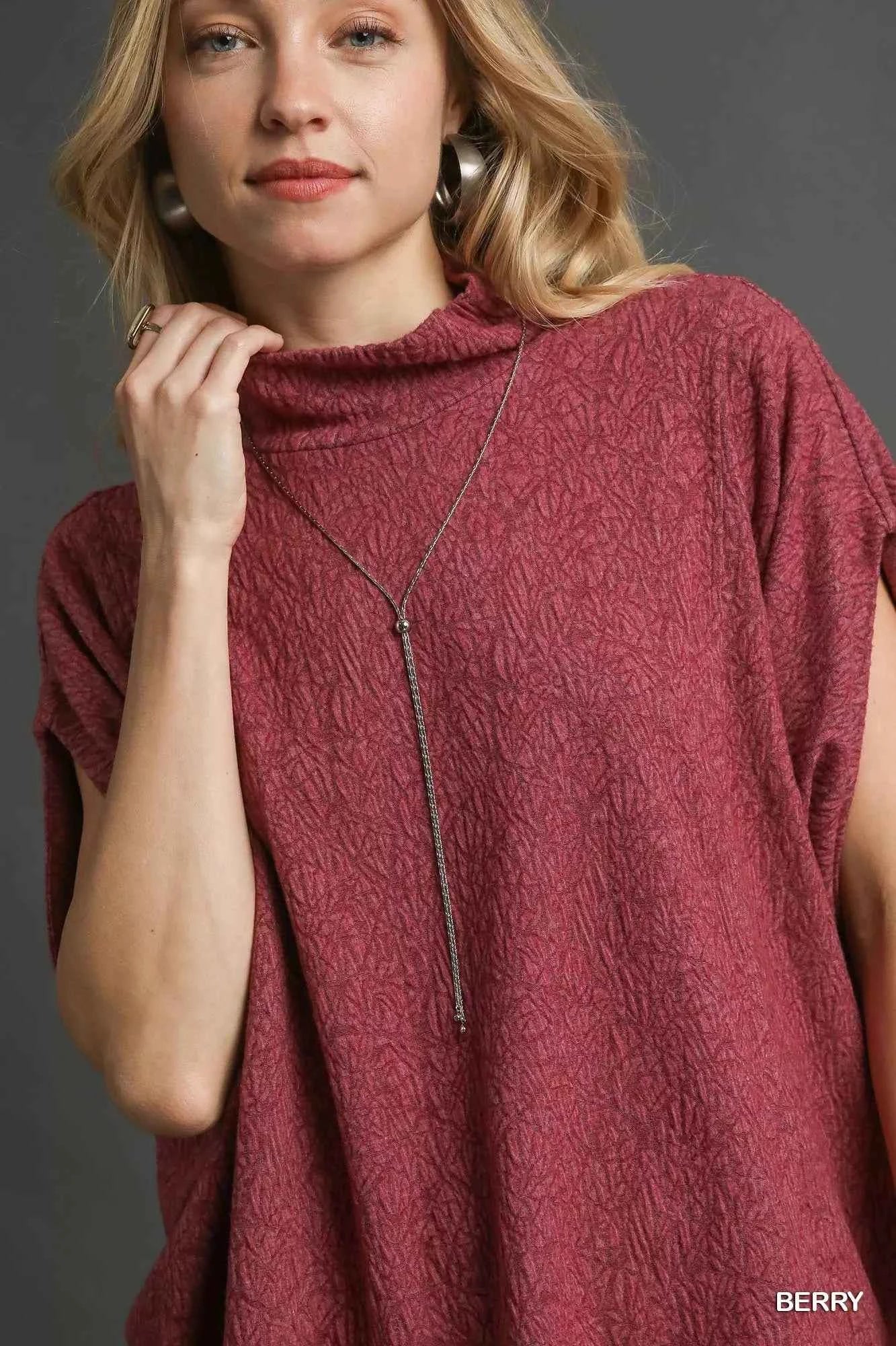 Umgee Textured Mock Neck Relaxed Top 1e5f4a18-fd7b-4e18-9f11-f05d3e42366c-Max-Origin