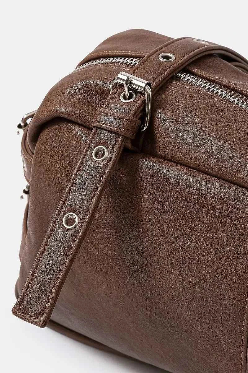 Fame Multi Grommet Belt Strap Rustic Rectangular Hand Bag 1f76adccbec74adabf26d7d33cb78a21-Max-Origin