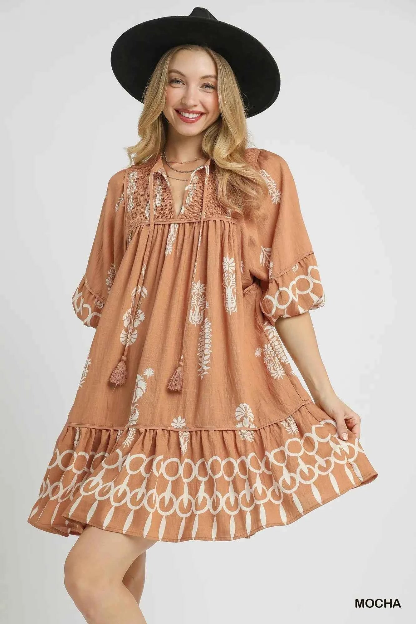 Umgee Boarder Print Tassel Tie Neck Mini Dress Mocha 1fc8eeca-00fc-4027-83ed-c7bd17beff19-Max-Origin