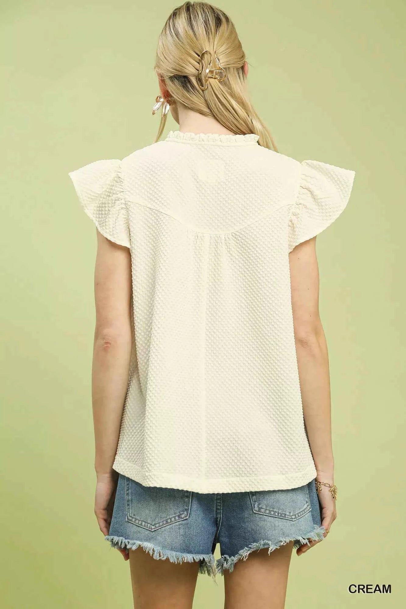 Umgee Embroidered Flutter Sleeve Blouse 211fb075-1069-41db-bfa1-2ea1db078c8f-Max-Origin