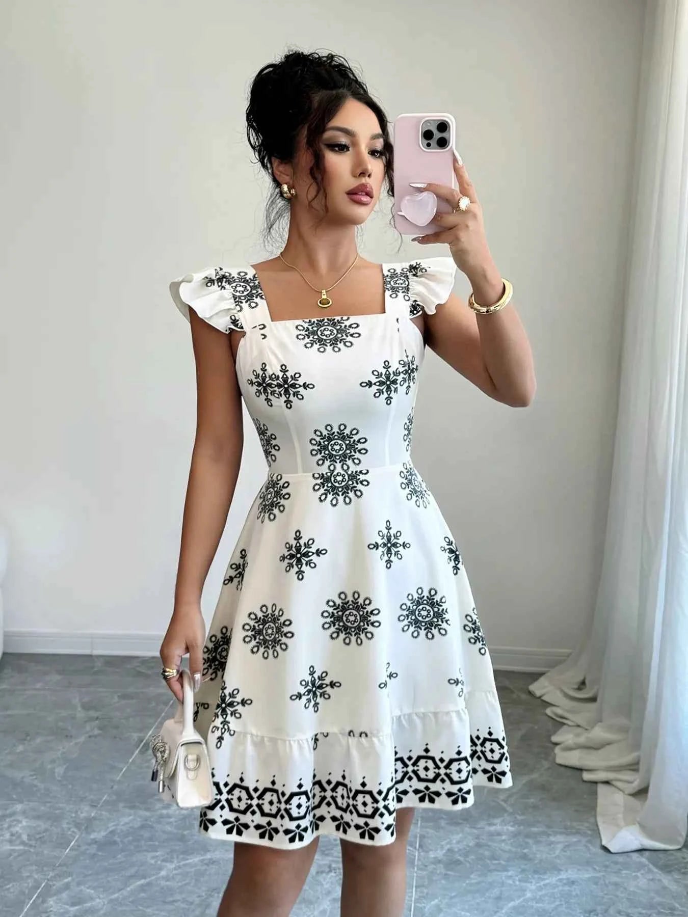 Printed Ruffled Cap Sleeve Dress 21445cf7-f051-4728-918d-b4415cda8380-Max-Origin