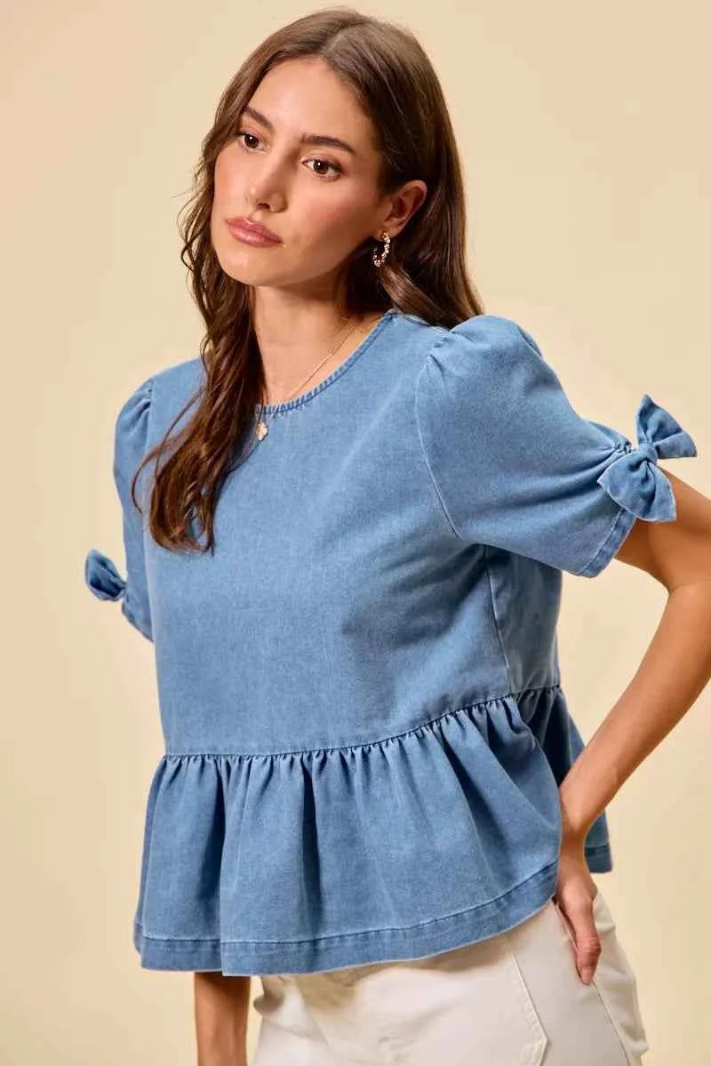SO ME Denim Bow Detail Short Sleeves Peplum Top 219f54512f3e44a3a578cd5bb389d3e0-Max-Origin