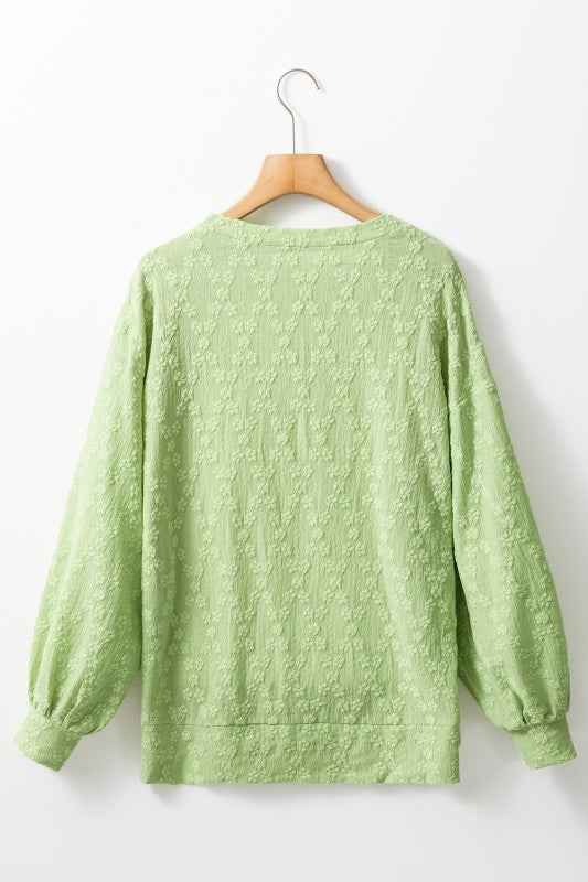 Solid Color Textured Side Split Crew Neck Blouse 24264704_53611561-bb77-49c8-91e3-9e37bff21525