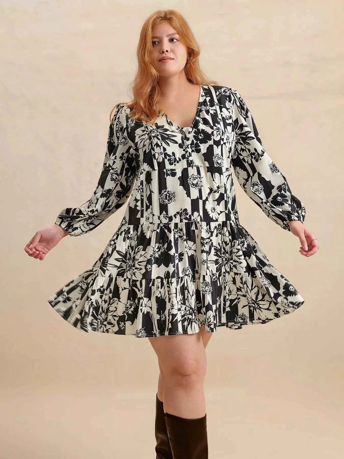 Plus Size Printed V-Neck Long Sleeve Mini Dress 26dd8bc2-1841-4193-bb9a-78c7b6959881-Max-Origin