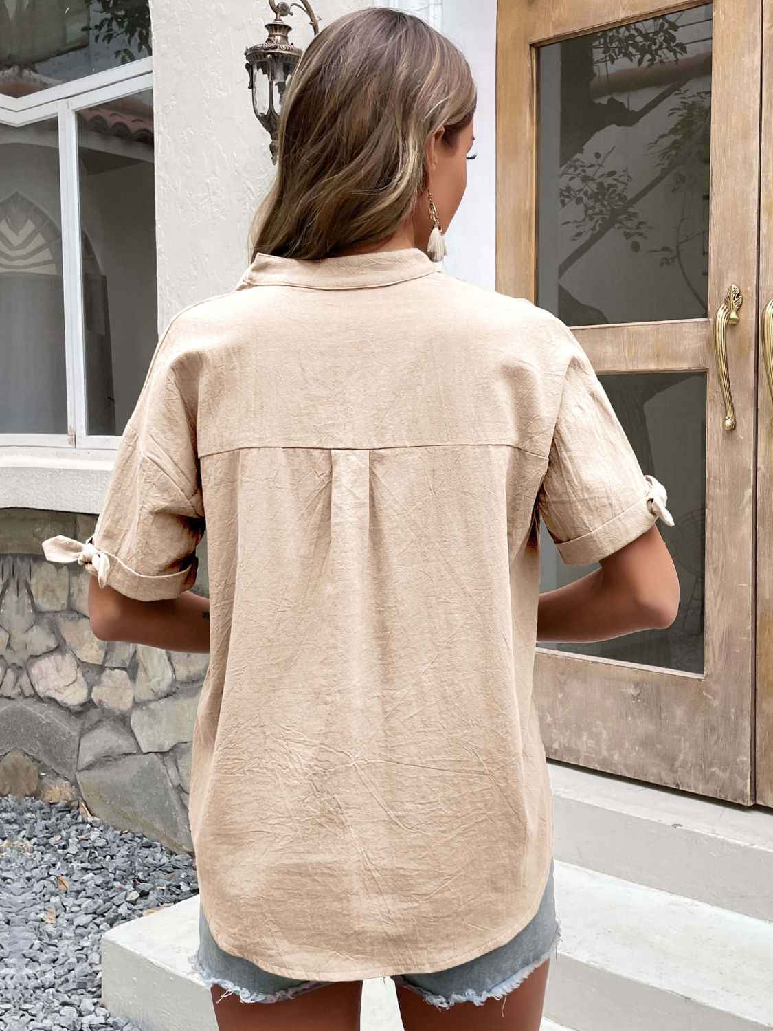 Perfee Buttoned Notched Neck Cuffed Sleeve Blouse 287c81cad8e94545b8de548673cee53d-Max