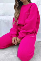 Round Neck Sweatshirt and Joggers Set 289436cd-4eb5-4ea2-a36f-8333287574c0-Max-Origin