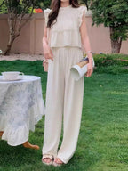Ruffled Sleeveless Top and Wide Leg Pants Set 28c4df90-a730-408e-8f60-60367d6acca1-Max-Origin