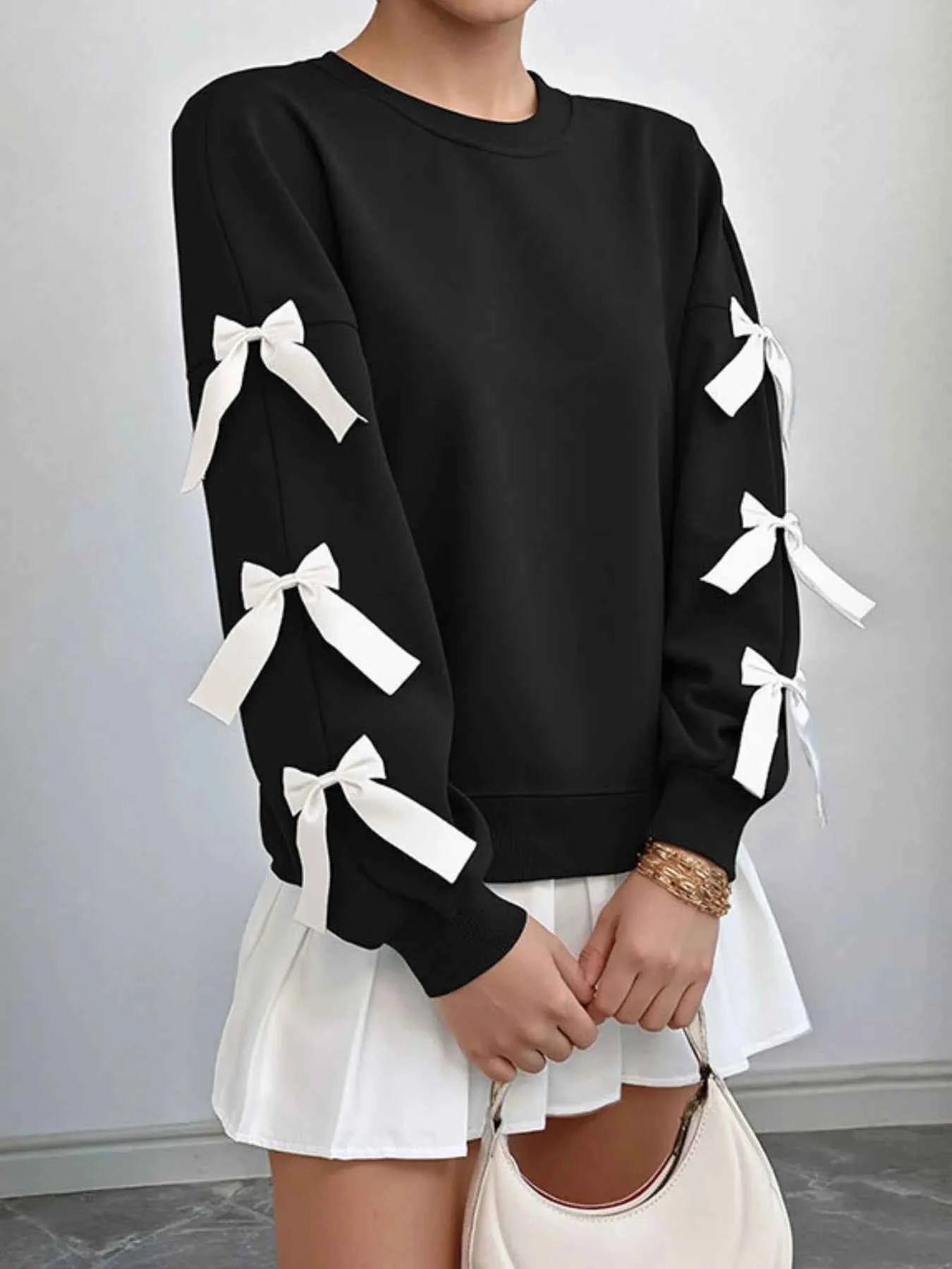Bow-Detailed Sleeve Round Neck Sweatshirt Black 28ef1742-8677-4cf7-809f-9da66e7a53f7-Max-Origin