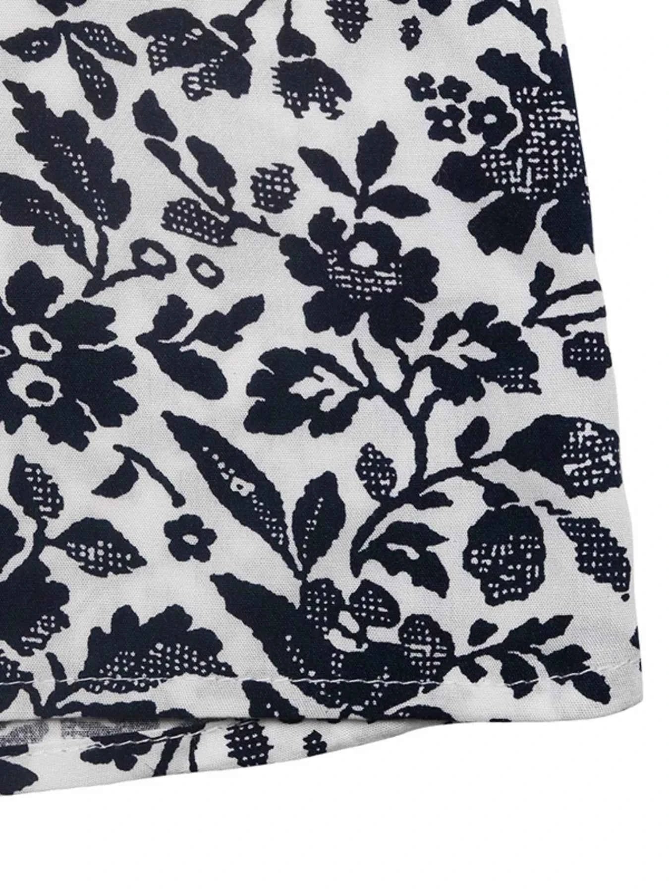 Printed Tie Neck Long Sleeve Blouse 2a8b9efd442749a58f0f0bace05a2d36-Max-Origin