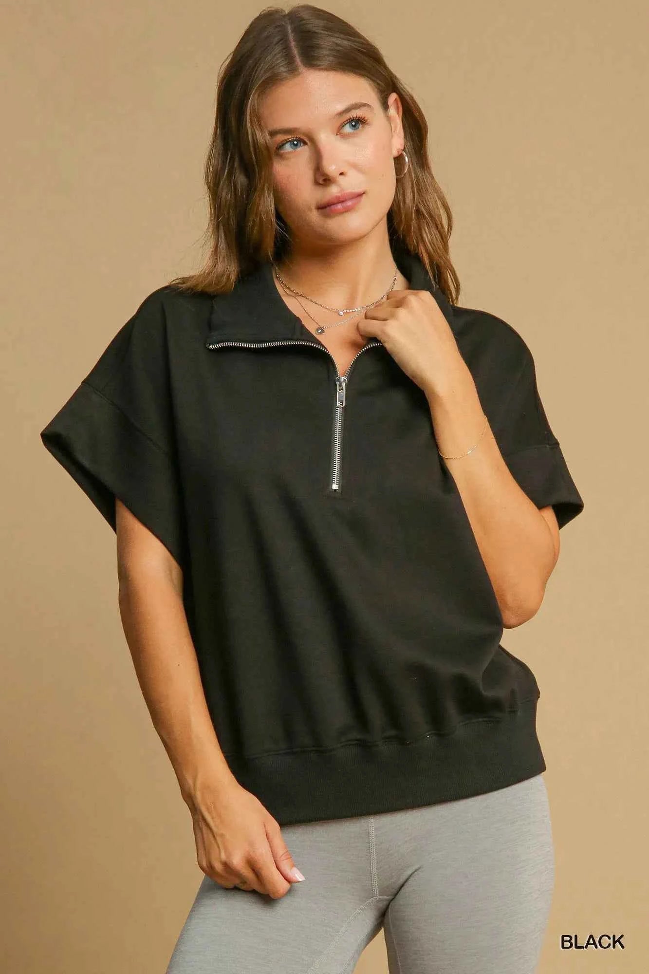 Umgee Full Size Half-Zip Short Sleeve Top Plus Size Black 2ad04da1-2496-425e-8eac-cbca098e0cb1-Max-Origin