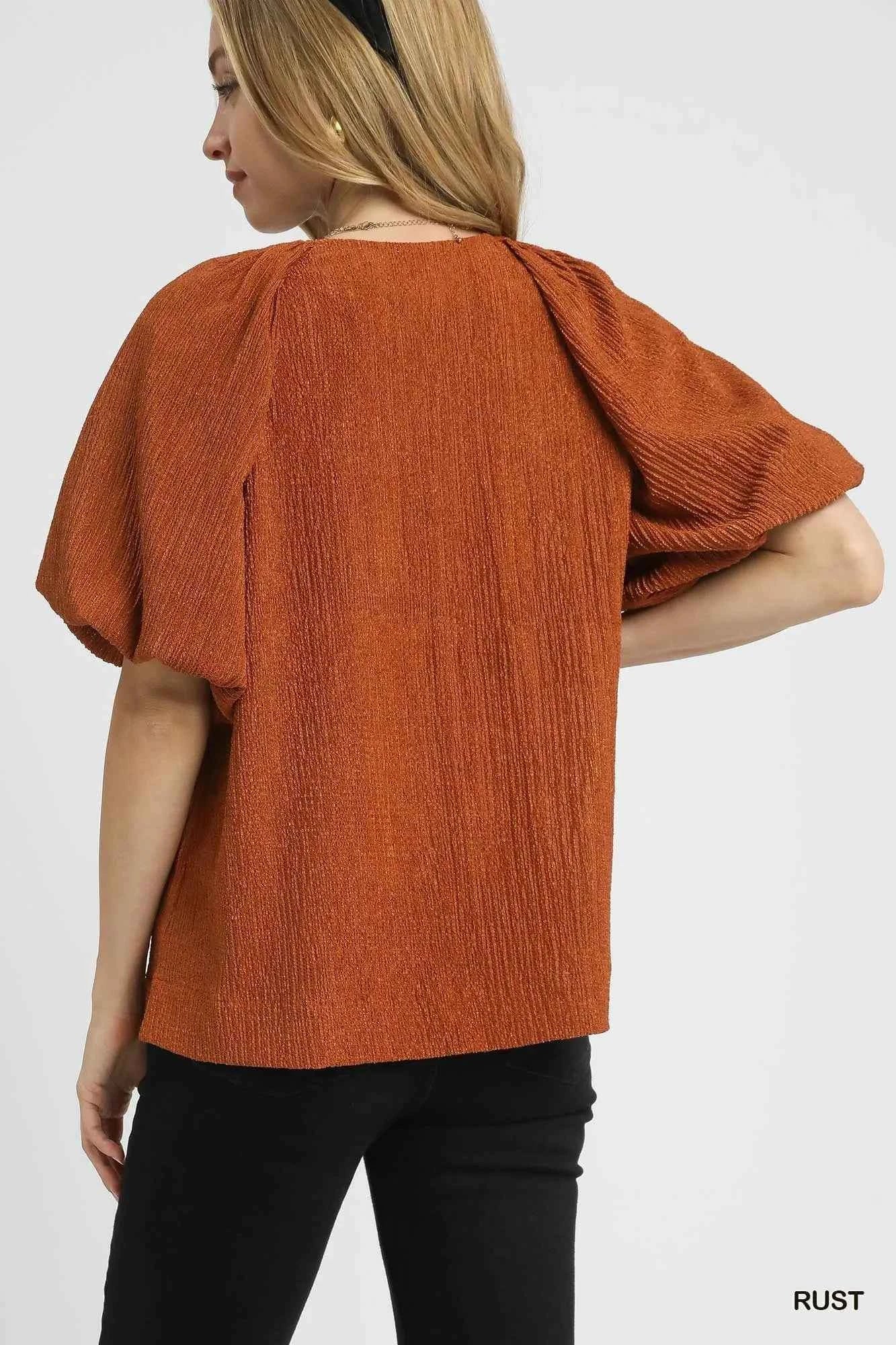 Umgee Textured Flutter Sleeve Notch Neck Top 2b08f4a4-7705-4c6e-aaaa-b0d5d07bb348-Max-Origin