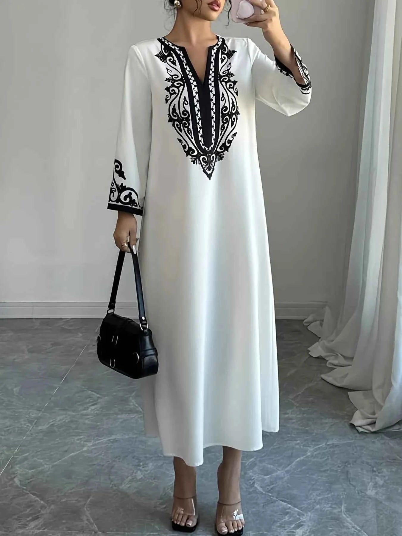 Printed Notched Long Sleeve Midi Dress 2e345db0b61343b484855576f553fc92-Max-Origin