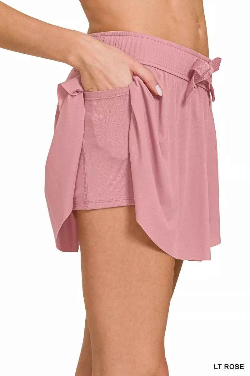 Zenana Ruffle Hem Tennis Skirt With Hidden Inner Pockets 2e791159-df1d-49d1-8106-8745bc549a51-Max-Origin