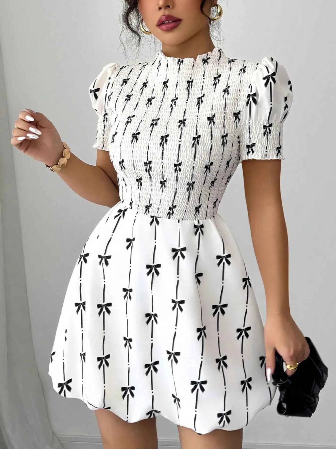 Smocked Bow Print Short Sleeve Dress 2f6d7b41f134472bb2b14b493fd02a9d-Max-Origin