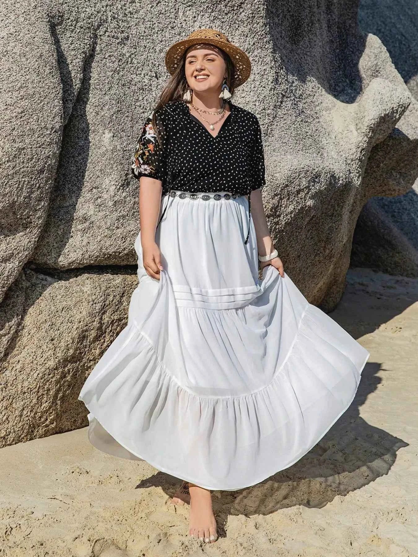 Plus Size Printed Tie Neck Half Sleeve Blouse 3044525c-80cd-4cdd-835c-f031c016f3c0-Max-Origin