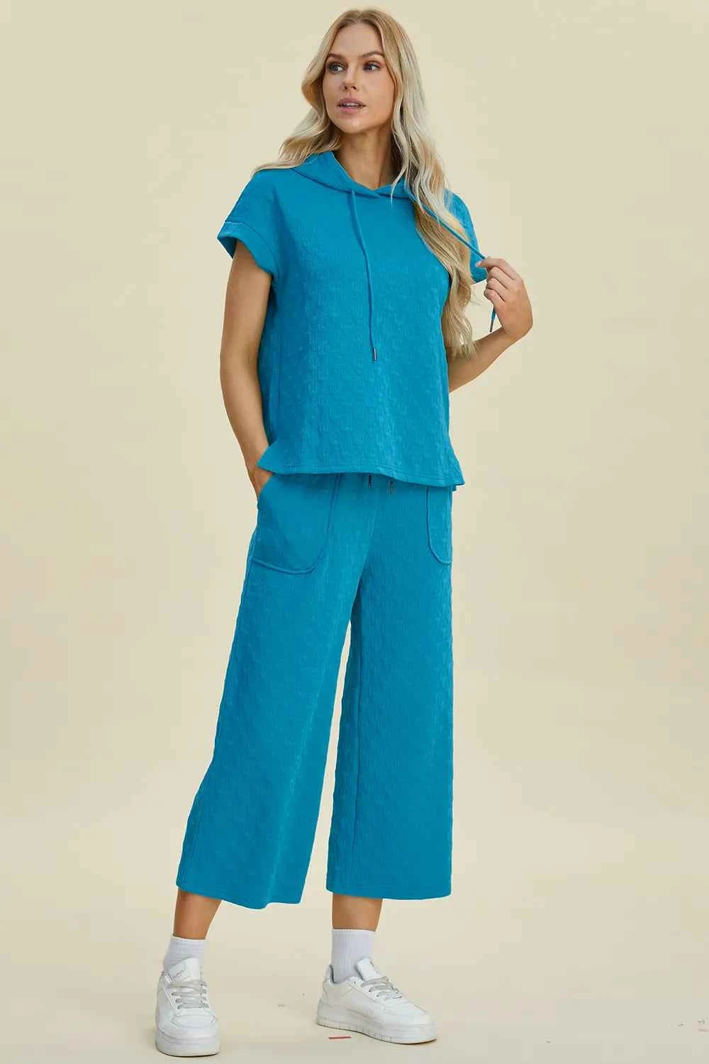 Double Take Full Size Texture Drawstring Short Sleeve Hoodie and Pocketed Pants Set 32b7febe-378a-4af7-bc27-01fb0d214c71-Max