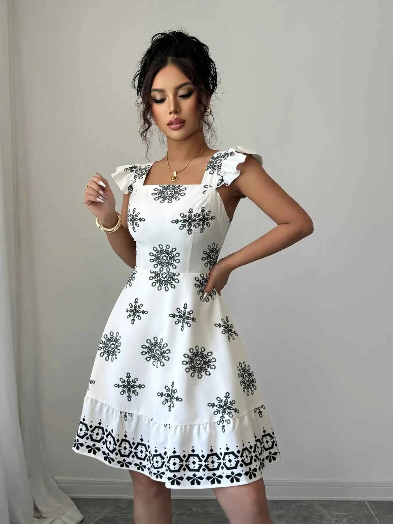 Printed Ruffled Cap Sleeve Dress 32d73544-cc80-4e2f-92fd-49c974a35f63-Max-Origin