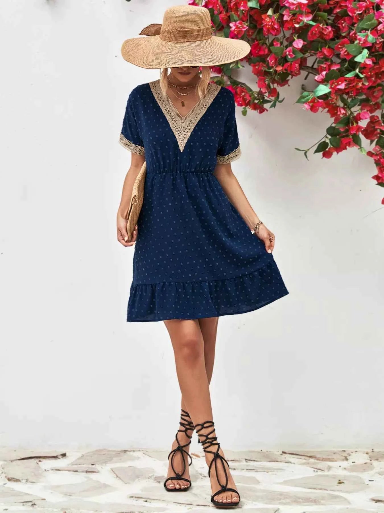 V-Neck Swiss Dot Ruffle Hem Mini Dress 33550139-538c-452e-bcf2-9e2d65112cca-Max-Origin