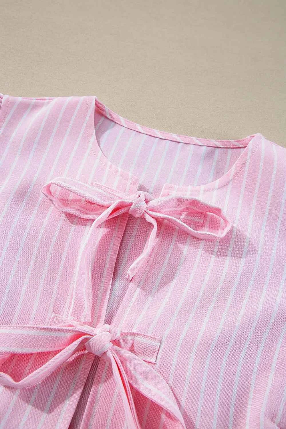 Tie Front Striped Peplum Blouse 34edc77e-ac90-44b6-8e51-398e75ea118d-Max-Origin