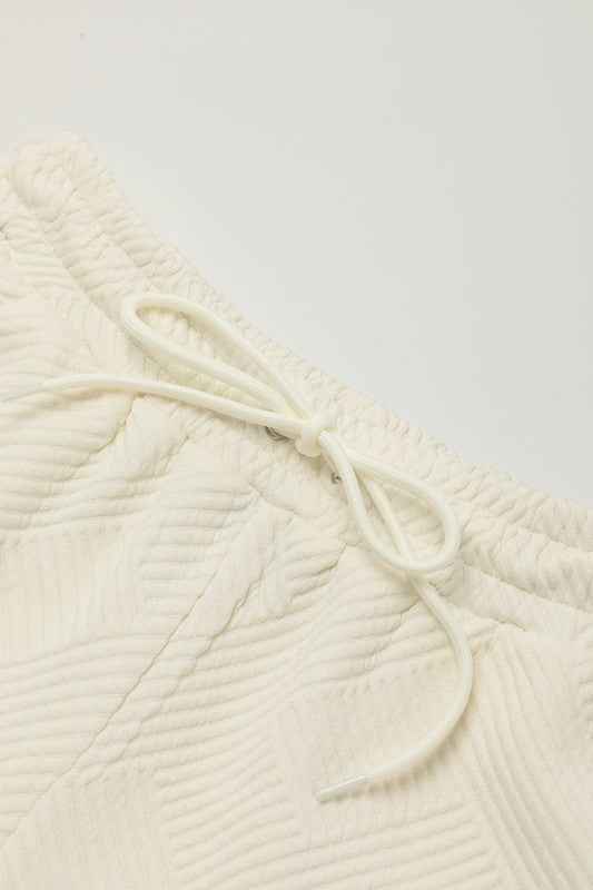 Textured Short Sleeve Top and Shorts Set 388ab243-591d-4e1f-b571-e5c4ef929ccd