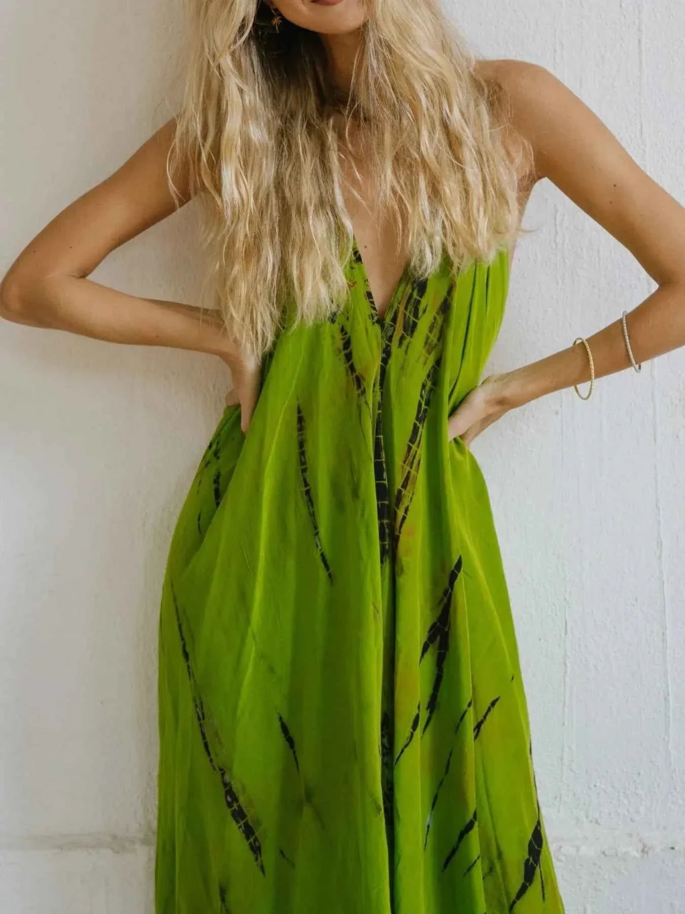 Asymmetrical Hem Printed Halter Neck Dress 39581b36-9fdd-4c2b-a06e-6e4266224dfd-Max-Origin